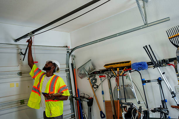Professional Garage Door Panel Replacement technician working in Houston, MS
